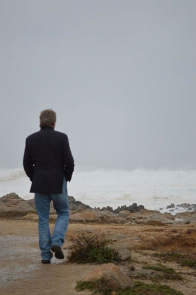 photo of Dwayne walking on shore